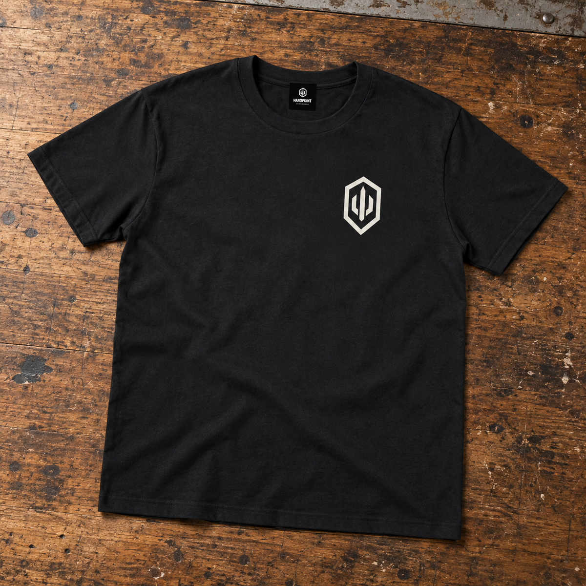 HARDPOINT Bone Deep Tee, Classic Black, front view. AI-styled product mockup.