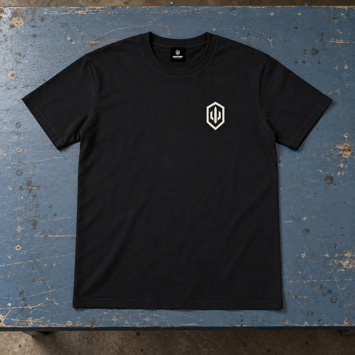HARDPOINT Hard to Ignore Tee, Classic Black, front view. AI-styled product mockup.