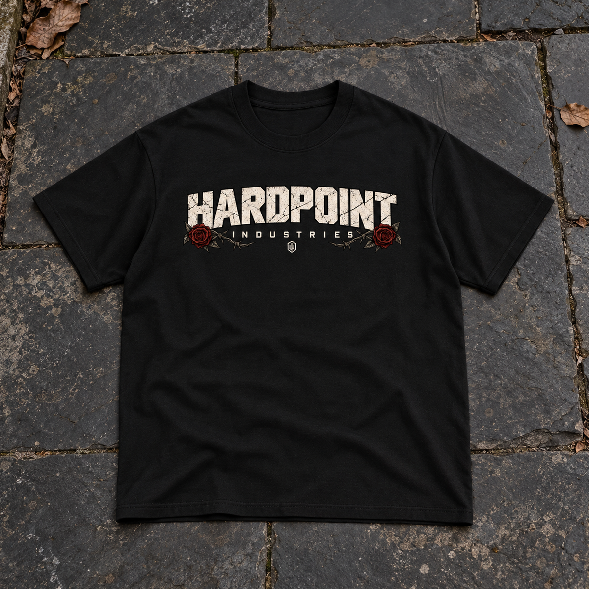 HARDPOINT Last Rites Tee, Black, front view. AI-styled product mockup.