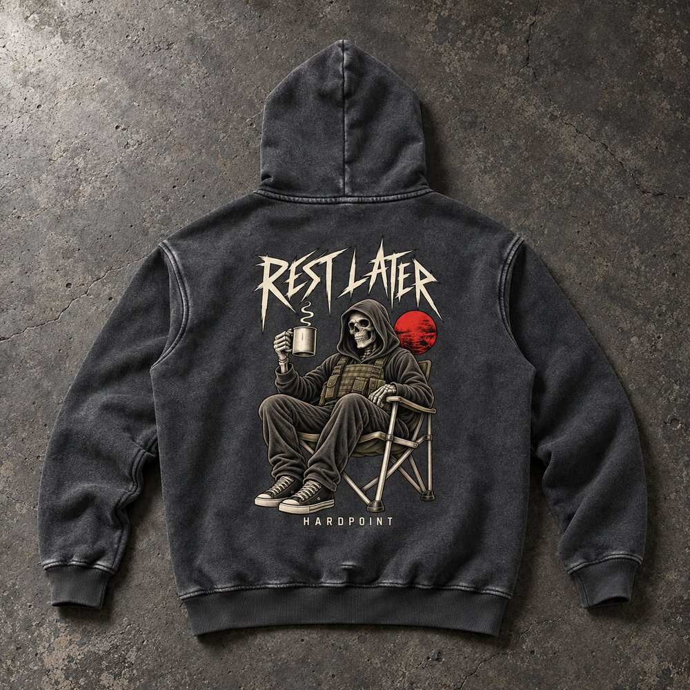 Rest Later Hoodie, Black, back view on concrete. AI-styled product mockup.