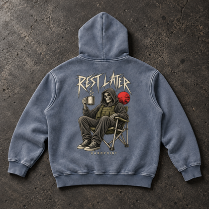 Rest Later Hoodie, Royal Blue, back view on concrete. AI-styled product mockup.